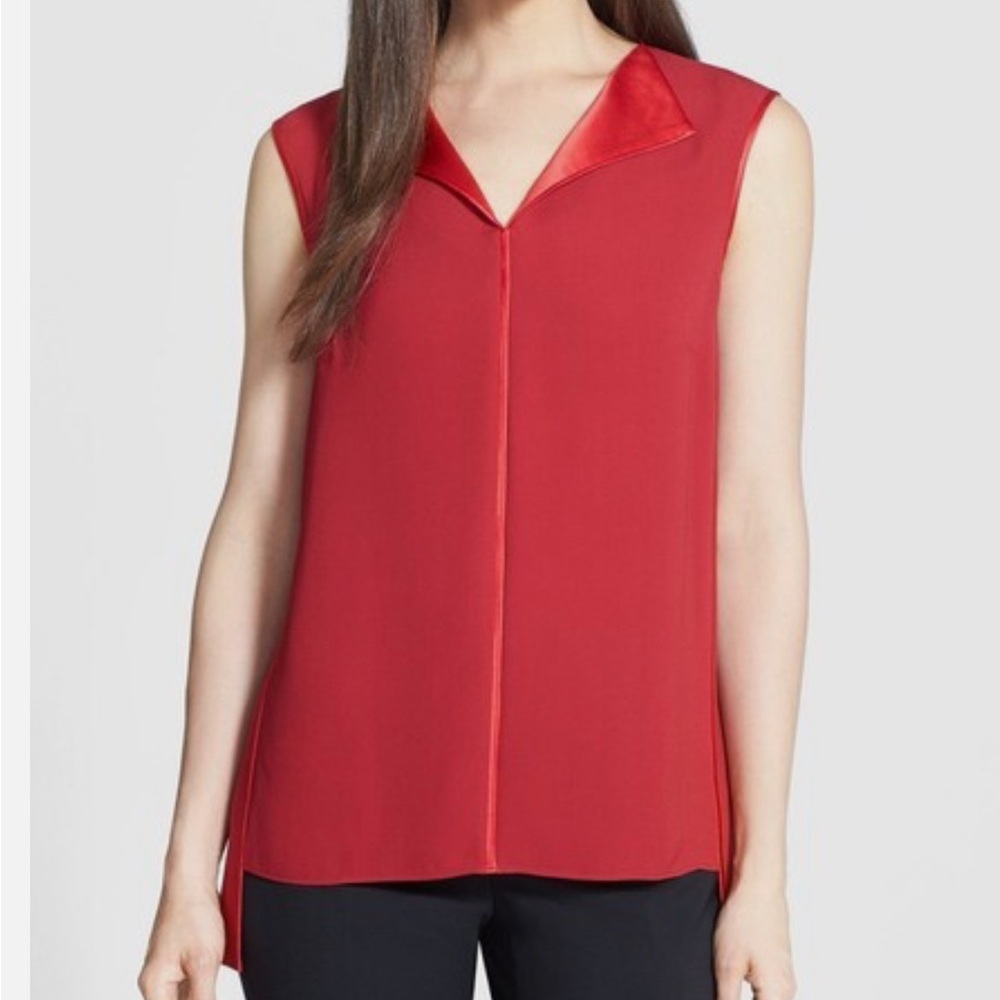 Lafayette 148 New York silk blouse, no tag so you win.